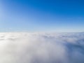 Aerial view White clouds in blue sky. Top view. View from drone. Aerial bird`s eye view. Aerial top view cloudscape. Texture of cl Royalty Free Stock Photo