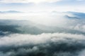 Aerial view of white fog above tea plantation Royalty Free Stock Photo