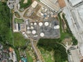 Aerial view white fuel storage tank in oil refinery plant. Top view white Industrial tanks for petrol and oil.High angle view Royalty Free Stock Photo