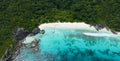 Aerial view of white sand beach tropical with seashore as the island in a coral reef ,blue and turquoise sea Amazing nature Royalty Free Stock Photo