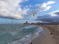 Aerial view on white sandy Corallejo dunes, beach, ocean water and kite surfers at winter