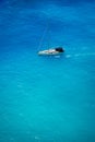 Aerial view of white yacht in deep blue sea Royalty Free Stock Photo