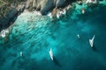 Aerial view of white yachts sailing in turquoise lagoon. Travelling and holiday concept