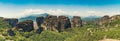 Aerial view, wide panoramic shot of known Greek rock formations and monasteries on the top. Meteora, Greece. Beautiful Royalty Free Stock Photo