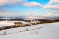 Aerial view of wind farm or wind park, with high wind turbines for generation electricity