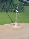 Aerial View : Wind turbine in a field Royalty Free Stock Photo