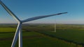 Aerial view of wind turbine park generating environmental friendly energy. Royalty Free Stock Photo