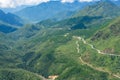 Aerial view of winding mountain road and magnificent valley Royalty Free Stock Photo