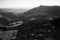 Aerial view of a winding mountain road in the Serra da Estrela, Portugal. Black and white photo. Royalty Free Stock Photo