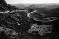 Aerial view of winding road in Serra da Estrela, Portugal. Black and white photo. Royalty Free Stock Photo