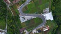 Aerial view, winding road in Tawangmangu on the edge there are plantation fields