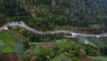 Aerial view, winding road in Tawangmangu on the edge there are plantation fields