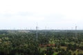 Aerial view of Windmill field in a village from the top of mountain Royalty Free Stock Photo