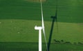 Aerial view of windturbine and green meadow Royalty Free Stock Photo