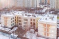 Aerial view winter apartment building exterior mixed-use urban multi-family residential district area development Royalty Free Stock Photo