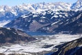 Aerial view of winter Austria village, Zell am See lake and sunny Alp mountains Royalty Free Stock Photo