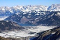 Aerial view of winter Austria village, Zell am See lake and sunny Alp mountains