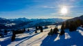 Aerial view Winter wonderland in the Alps with mountain chalet at sunset  Switzerland in winter with a lot of snow. Laax Royalty Free Stock Photo