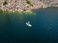 Aerial view on woman on sup board with paddle in the lake Royalty Free Stock Photo