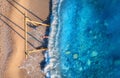 Aerial view of woman on the swing, beautiful blue sea with waves Royalty Free Stock Photo