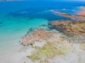 Guernsey island & white sand beach, blue transparent water and rocks