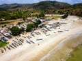 Aerial view of wooden boats on a tropical sandy beach (Selong Belanak, Lombok