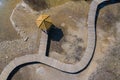 Aerial view of wooden path over turquiose lake colour. Drought. Drone top view Royalty Free Stock Photo