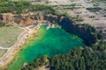 Aerial view of wooden path over turquiose lake colour. Drought. Drone top view Royalty Free Stock Photo