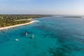 Aerial view of wooden sail boats near Wide White Coastal Beach Line in Kendwa village, Zanzibar Royalty Free Stock Photo