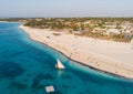 Aerial view of wooden sail boats near Wide White Coastal Beach Line in Kendwa village, Zanzibar Royalty Free Stock Photo