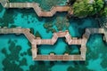 Aerial view of a wooden walkway in the turquoise ocean. Travel concept Royalty Free Stock Photo