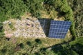 Arial view of male worker installing photovoltaic solar panel. Royalty Free Stock Photo