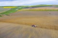 Aerial view of working tractor Royalty Free Stock Photo