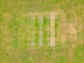 Aerial view of a worn out cricket green field during a summer drought