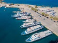 Aerial view of the yacht club. Aerial top-down view of docked sailboats in Mediterranean sea Royalty Free Stock Photo