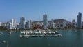 Aerial view of a yacht club in a beautiful bay in Cartagena, Colombia. Camera movement from left to right.