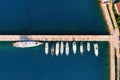 Aerial view of the yacht club. Aerial top-down view of docked sailboats in marine bay Royalty Free Stock Photo
