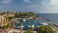 Aerial view of yacht harbor and red house roofs in Old town timelapse Antalya, Turkey.