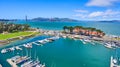 Aerial view of yacht harbor in San Francisco with Golden Gate Bridge in distance Royalty Free Stock Photo