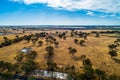 Yellow pastures in Australian outback in bright daylight. Royalty Free Stock Photo