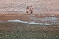 Aerial view on a young couple lying on the beach Royalty Free Stock Photo