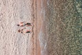 Aerial view on a young couple lying on the beach Royalty Free Stock Photo