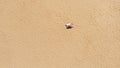 Aerial view of a young couple lying on the white sand. man and woman spend time together and travel through the desert Royalty Free Stock Photo