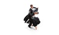 Aerial view of young graceful artistic couple, man and woman dancing waltz isolated over white studio background Royalty Free Stock Photo