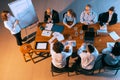 Aerial view of young multiethnic people talking, working with colleagues, co-workers at office, indoors. Work, finance Royalty Free Stock Photo