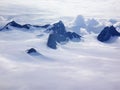 Mountains sinking in clouds and snow in Alaska, USA