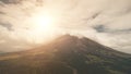 Aerial volcano erupt at sun light closeup. Nobody nature landscape at Legazpi town, Mayon mount