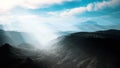 Aerial vulcanic desert landscape with rays of light