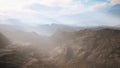 Aerial vulcanic desert landscape with rays of light