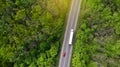 Aerial. Wagon driving by the highway. Transport logistics background. Royalty Free Stock Photo